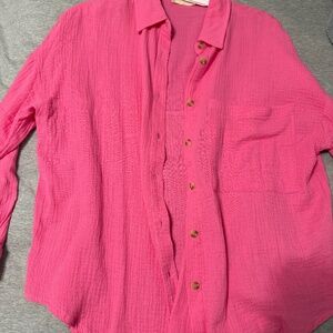 pink button up shirt